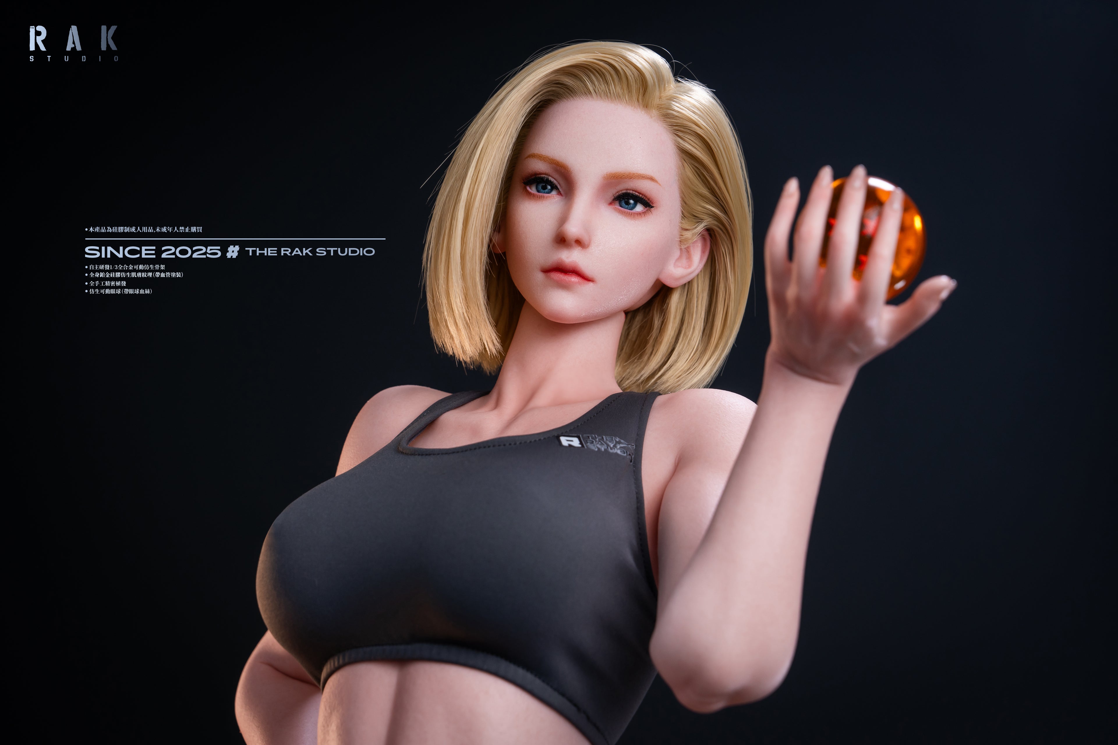 Statue of a woman in a black sports bra holding an orange against a dark background, with &